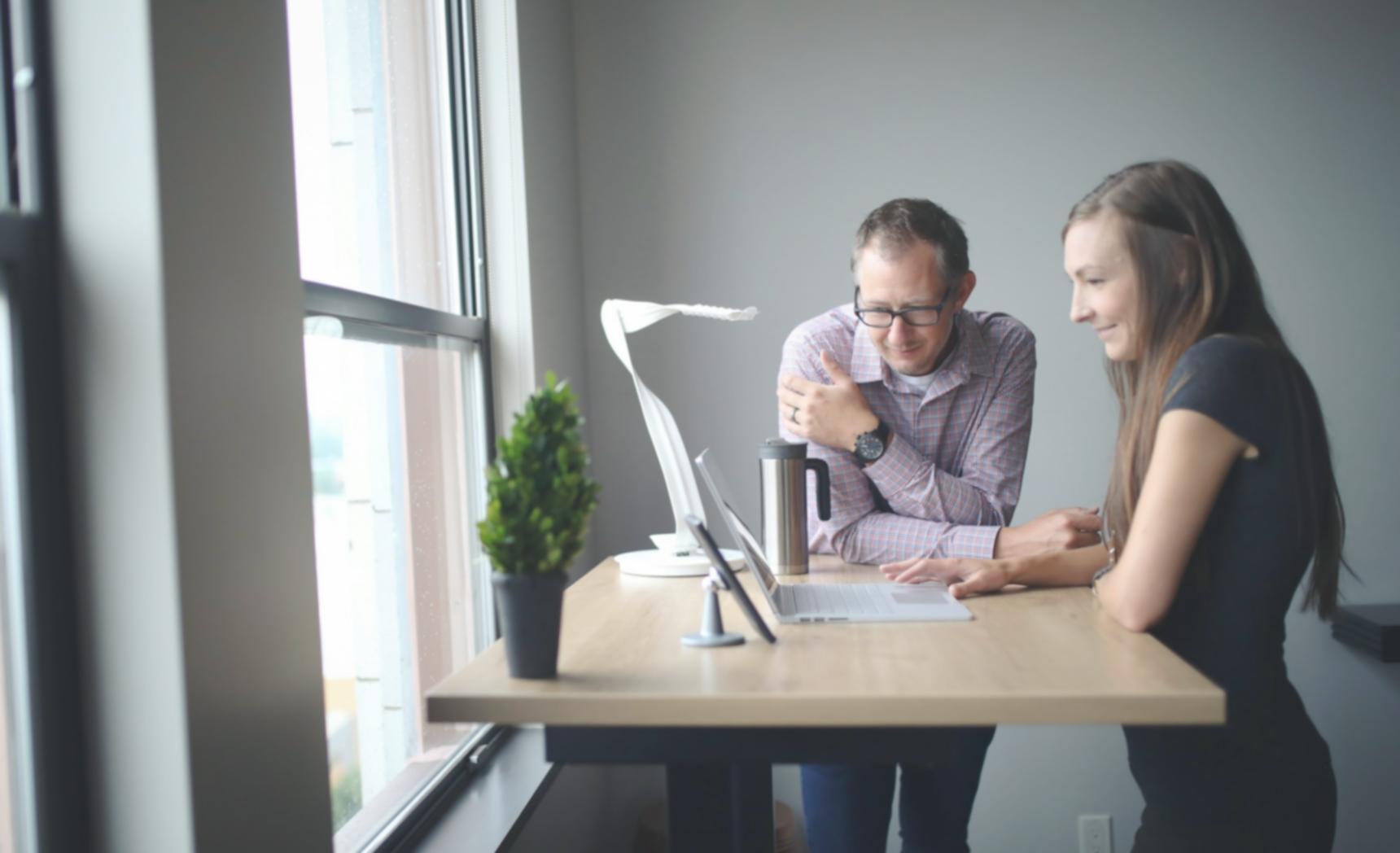 Professional financial consultation session with charts and planning documents